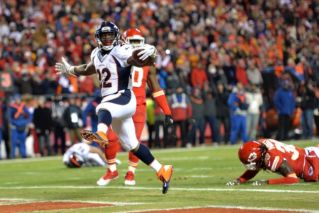 KANSAS CITY, MO - NOVEMBER 30:  C.J. Anderson #22 of the Denver Broncos celebrates scoring a touchdown against the Kansas City Chiefs during the first quarter at Arrowhead Stadium on November 30, 2014 in Kansas City, Missouri.  (Photo by Peter Aiken/Getty Images)