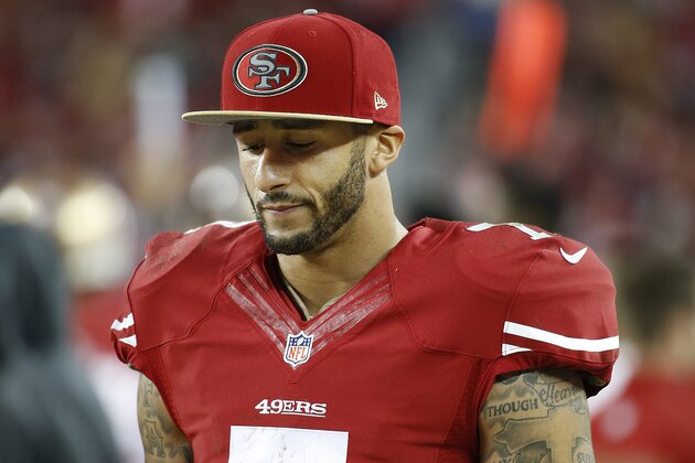 San Francisco 49ers quarterback Colin Kaepernick (7) stands on the sideline during the fourth quarter of an NFL football game against the Seattle Seahawks in Santa Clara, Calif., Thursday, Nov. 27, 2014. The Seahawks 19-3. (AP Photo/Tony Avelar)