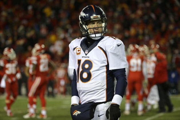 Denver Broncos quarterback Peyton Manning (18) looks down field in the second half of an NFL football game against the Kansas City Chiefs in Kansas City, Mo., Sunday, Nov. 30, 2014. (AP Photo/Charlie Riedel)