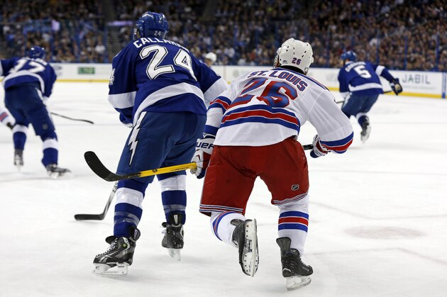 TAMPA, FL - NOVEMBER 26:  Ryan Callahan #24 of the Tampa Bay Lightning and Martin St. Louis #26 of the New York Rangers move up ice at the Amalie Arena on November 26, 2014 in Tampa, Florida. (Photo by Mike Carlson/Getty Images)