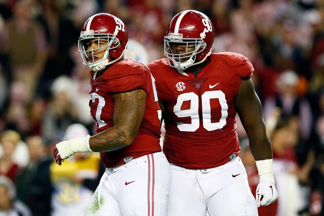 TUSCALOOSA, AL - NOVEMBER 29:  D.J. Pettway #57 of the Alabama Crimson Tide reacts after sacking Nick Marshall #14 of the Auburn Tigers in the fourth quarter during the Iron Bowl at Bryant-Denny Stadium on November 29, 2014 in Tuscaloosa, Alabama.  (Photo by Kevin C. Cox/Getty Images)