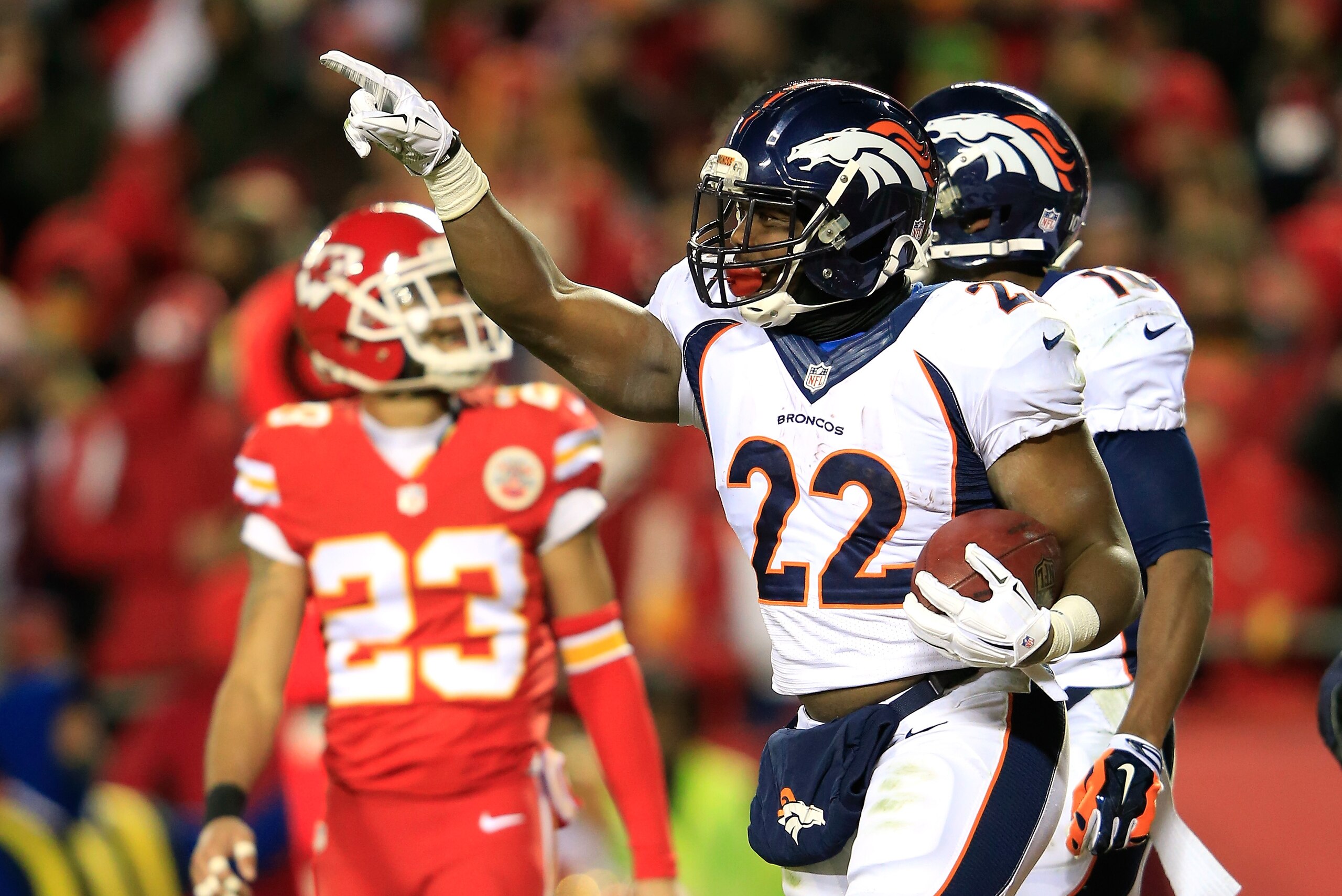 KANSAS CITY, MO - NOVEMBER 30:  C.J. Anderson #22 of the Denver Broncos celebrates scoring a touchdown against the Kansas City Chiefs during the first half at Arrowhead Stadium on November 30, 2014 in Kansas City, Missouri.  (Photo by Jamie Squire/Getty Images)