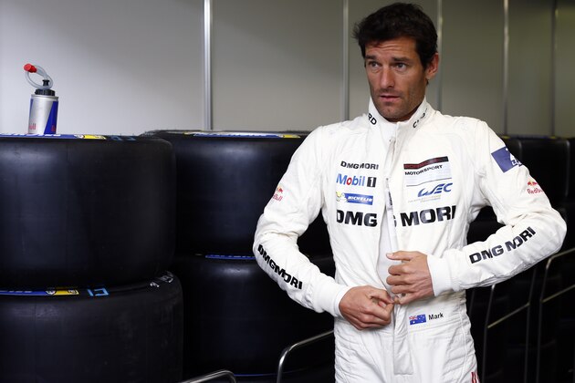 LE MANS, FRANCE - JUNE 14:  Porsche Team, Mark Webber, is seen preparing for the warm-up session on June 14, 2014 in Le Mans, France.  (Photo by Andrew Hone/Getty Images)