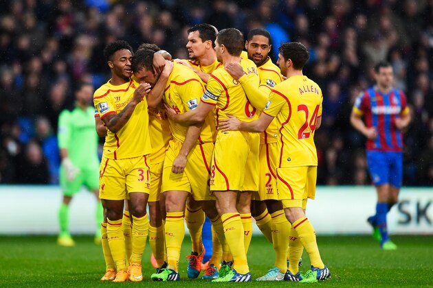 LONDON, ENGLAND - NOVEMBER 23:  Rickie Lambert of Liverpool is mobbed by team mates after scoring the opening goal during the Barclays Premier League match between Crystal Palace and Liverpool at Selhurst Park on November 23, 2014 in London, England.  (Photo by Mike Hewitt/Getty Images)