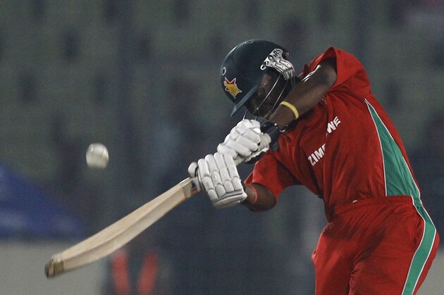 Zimbabwe's captain Elton Chigumbura plays a shot during the third one day International cricket match against Bangladesh in Dhaka, Bangladesh, Wednesday, Nov. 26, 2014. (AP Photo/ A.M. Ahad)