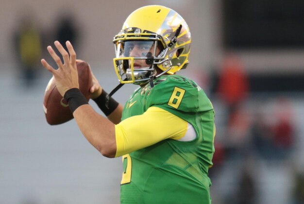 Nov 29, 2014; Corvallis, OR, USA; Oregon Ducks quarterback Marcus Mariota (8) warms up before the game against the Oregon State Beavers at Reser Stadium. Mandatory Credit: Scott Olmos-USA TODAY Sports