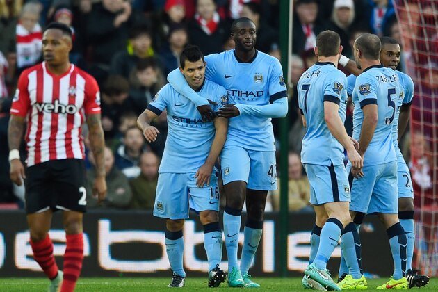 SOUTHAMPTON, ENGLAND - NOVEMBER 30:  Despair for Nathaniel Clyne of Southampton as Sergio Aguero (16) and Yaya Toure (42) celebrate a goal by Gael Clichy of Manchester City (not pictured) for their thir goal during the Barclays Premier League match between Southampton and Manchester City at St Mary's Stadium on November 30, 2014 in Southampton, England.  (Photo by Mike Hewitt/Getty Images)