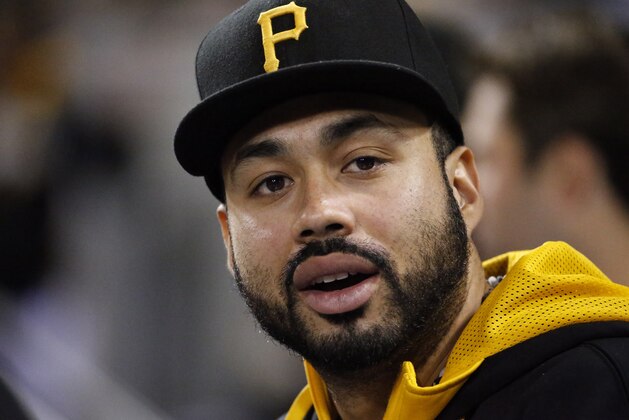 Pittsburgh Pirates' Pedro Alvarez sits in the dugout during a baseball game against the Boston Red Sox in Pittsburgh Tuesday, Sept. 16, 2014. (AP Photo/Gene J. Puskar)