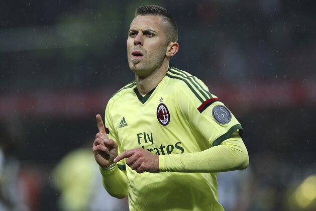MILAN, ITALY - NOVEMBER 30:  Jeremy Menez of AC Milan celebrates after scoring his second goal during the Serie A match between AC Milan and Udinese Calcio at Stadio Giuseppe Meazza on November 30, 2014 in Milan, Italy.  (Photo by Marco Luzzani/Getty Images)