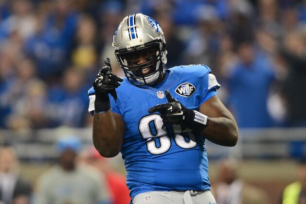 Nov 27, 2014; Detroit, MI, USA; Detroit Lions defensive tackle Andre Fluellen (96) celebrates after sacking Chicago Bears quarterback Jay Cutler (not pictured) during the third quarter at Ford Field. Mandatory Credit: Andrew Weber-USA TODAY Sports