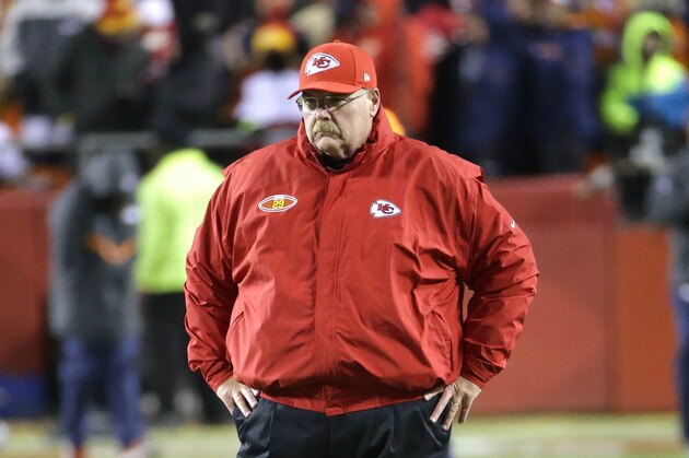 Kansas City Chiefs head coach Andy Reid follows warmups before an NFL football game against the Denver Broncos in Kansas City, Mo., Sunday, Nov. 30, 2014. (AP Photo/Charlie Riedel)
