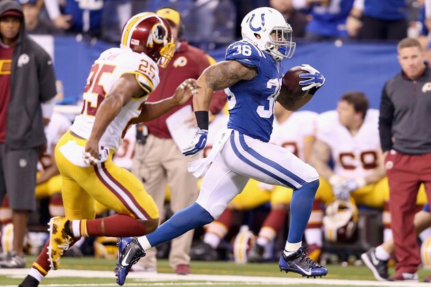 INDIANAPOLIS, IN - NOVEMBER 30:  Daniel Herron #36 of the Indianapolis Colts runs for a touchdown during the game against the Washington Redskins at Lucas Oil Stadium on November 30, 2014 in Indianapolis, Indiana.  (Photo by Andy Lyons/Getty Images)