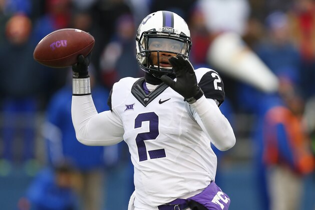 LAWRENCE, KS - NOVEMBER 15:  Trevone Boykin #2 of the TCU Horned Frogs drops back for a pass against the Kansas Jayhawks in first quarter at Memorial Stadium on November 15, 2014 in Lawrence, Kansas. (Photo by Ed Zurga/Getty Images)