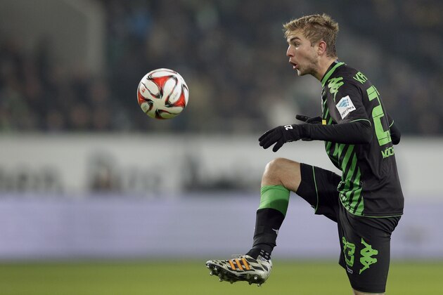 Moenchengladbach's Christoph Kramer plays the ball during the German Bundesliga soccer match between VfL Wolfsburg and Borussia Moenchengladbach at the Volkswagen Arena stadium in Wolfsburg, Germany, Sunday, Nov. 30, 2014. Wolfsburg defeated Moenchengladbach by 1-0. (AP Photo/Michael Sohn)