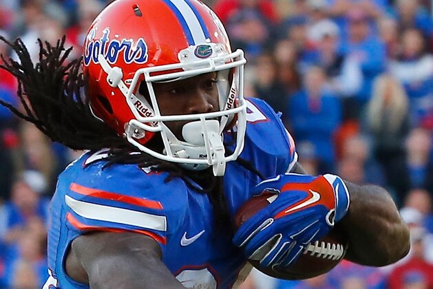JACKSONVILLE, FL - NOVEMBER 01:  Matt Jones #24 of the Florida Gators runs for yardage during the game against the Georgia Bulldogs at EverBank Field on November 1, 2014 in Jacksonville, Florida.  (Photo by Sam Greenwood/Getty Images)