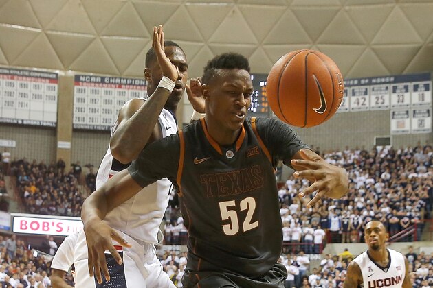 STORRS, CT- NOVEMBER 30:  Myles Turner #52 of the Texas Longhorns battles Phillip Nolan #1 of the Connecticut Huskies in the first half at Harry A. Gampel Pavilion on November 30, 2014 in Storrs, Connecticut. (Photo by Jim Rogash/Getty Images)