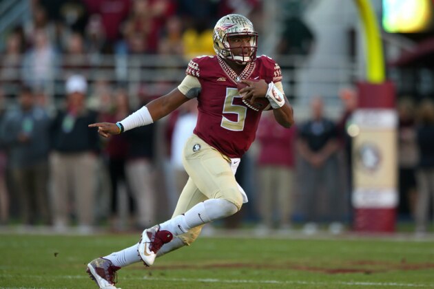 TALLAHASSEE, FL - NOVEMBER 29:  Jameis Winston #5 of the Florida State Seminoles looks turnover pass during  a game against the Florida Gators  at Doak Campbell Stadium on November 29, 2014 in Tallahassee, Florida.  (Photo by Mike Ehrmann/Getty Images)
