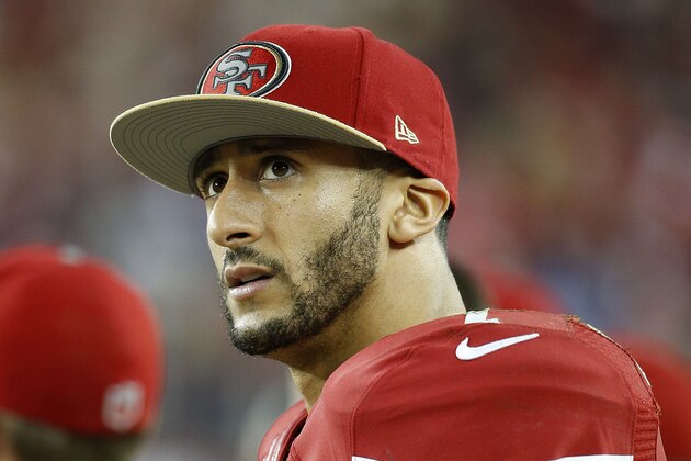 San Francisco 49ers quarterback Colin Kaepernick (7) stands on the sideline during the fourth quarter of an NFL football game against the Seattle Seahawks in Santa Clara, Calif., Thursday, Nov. 27, 2014. The Seahawks 19-3. (AP Photo/Tony Avelar)