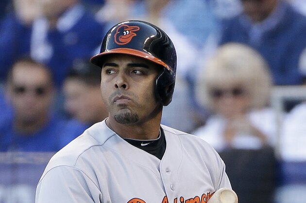 Baltimore Orioles' Nelson Cruz reacts after striking out during the fourth inning of Game 4 of the American League baseball championship series against the Kansas City Royals Wednesday, Oct. 15, 2014, in Kansas City, Mo. (AP Photo/Matt Slocum )