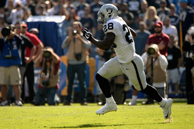 SAN DIEGO, CA - NOVEMBER 16:  Latavius Murray #28 of the Oakland Raiders carries the ball in the first quarter of the game against the San Diego Chargers at Qualcomm Stadium on November 16, 2014 in San Diego, California.  (Photo by Harry How/Getty Images)