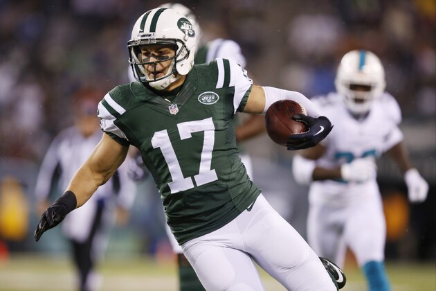 New York Jets wide receiver Greg Salas (17) runs for a touchdown against the Miami Dolphins during the first quarter of an NFL football game, Monday, Dec. 1, 2014, in East Rutherford, N.J. (AP Photo/Kathy Willens)