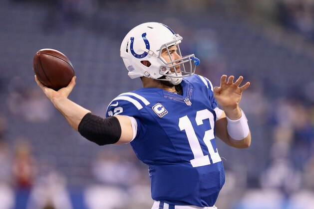 INDIANAPOLIS, IN - NOVEMBER 30:  Andrew Luck #12 of the Indianapolis Colts throws a pass before the game against the Washington Redskins at Lucas Oil Stadium on November 30, 2014 in Indianapolis, Indiana.  (Photo by Andy Lyons/Getty Images)