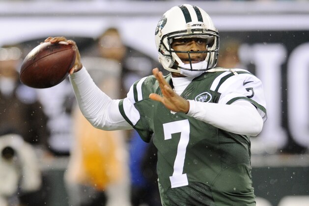 New York Jets quarterback Geno Smith (7) throws against the Miami Dolphins during the first quarter of an NFL football game, Monday, Dec. 1, 2014, in East Rutherford, N.J. (AP Photo/Bill Kostroun)