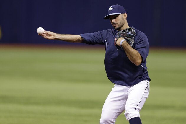Tampa Bay Rays' Sean Rodriguez throws the ball before a baseball game against the Baltimore Orioles Monday, June 16, 2014, in St. Petersburg, Fla. (AP Photo/Chris O'Meara)