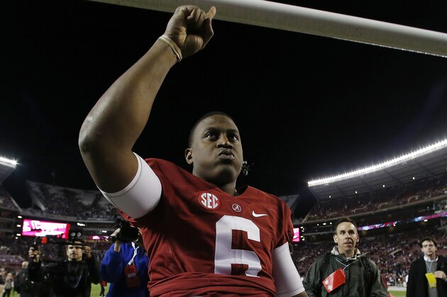 Alabama quarterback Blake Sims (6) celebrates after the second half of the Iron Bowl NCAA college football game against Auburn, Saturday, Nov. 29, 2014, in Tuscaloosa, Ala. Alabama won 55-44. (AP Photo/Butch Dill)