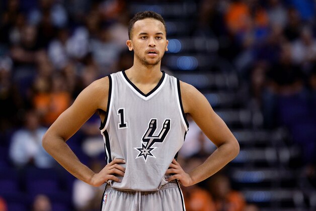 Oct 16, 2014; Phoenix, AZ, USA; San Antonio Spurs guard Kyle Anderson (1) looks up the court in the game against the Phoenix Suns at US Airways Center. Mandatory Credit: Jennifer Stewart-USA TODAY Sports