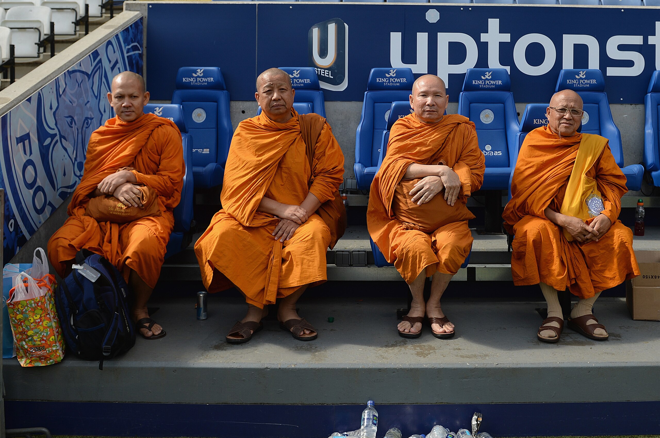 LEICESTER, ENGLAND - APRIL 19:  A group of monks sit on the Leicester bench after the Sky Bet Championship match between Leicester City and Queens Park Rangers at The King Power Stadium on April 19, 2014 in Leicester, England.  (Photo by Michael Regan/Getty Images)