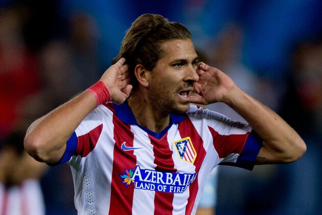 MADRID, SPAIN - OCTOBER 22:  Alessio Cerci of Atletico de Madrid celebrates scoring their fifth goal during the UEFA Champions League group A match between Club Atletico de Madrid and Malmo FF at Vicente Calderon stadium on October 22, 2014 in Madrid, Spain.  (Photo by Gonzalo Arroyo Moreno/Getty Images)