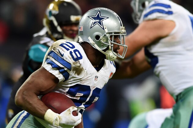 Dallas Cowboys running back DeMarco Murray (29) runs the ball against the Jacksonville Jaguars during the second half of an NFL football game at Wembley Stadium, London, Sunday, Nov. 9, 2014.  (AP Photo/Tim Ireland)