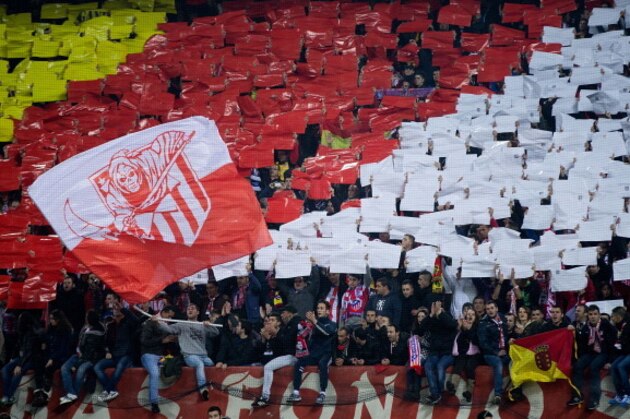 MADRID, SPAIN - JANUARY 11:  Frente Atletico, the Atletico de Madrid ultras, cheer their team with black and white cards prior to the start the La Liga match between Club Atletico de Madrid and FC Barcelona at Vicente Calderon Stadium on January 11, 2014 in Madrid, Spain.  (Photo by Gonzalo Arroyo Moreno/Getty Images)