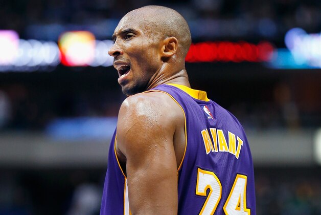 DALLAS, TX - NOVEMBER 21:  Kobe Bryant #24 of the Los Angeles Lakers reacts to a call against the Dallas Mavericks in the third quarter at American Airlines Center on November 21, 2014 in Dallas, Texas. NOTE TO USER: User expressly acknowledges and agrees that, by downloading and or using this photograph, User is consenting to the terms and conditions of the Getty Images License Agreement.  (Photo by Tom Pennington/Getty Images)