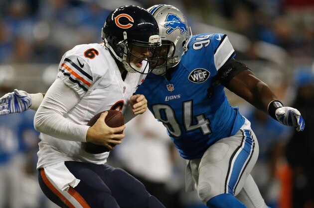 DETROIT, MI - NOVEMBER 27: Ezekiel Ansah #94 of the Detroit Lions sacks Jay Cutler #6 of the Chicago Bears in the fourth quarter at Ford Field on November 27, 2014 in Detroit, Michigan. The Detroit Lions win 34-17. (Photo by Gregory Shamus/Getty Images)