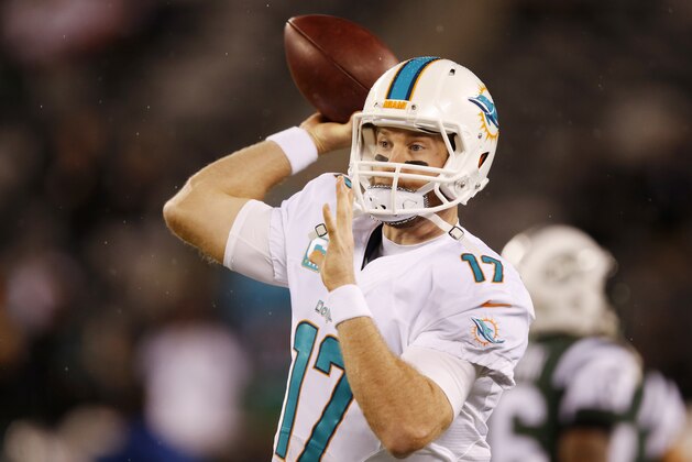 Miami Dolphins quarterback Ryan Tannehill (17) warms up before playing against the New York Jets in an NFL football game, Monday, Dec. 1, 2014, in East Rutherford, N.J. (AP Photo/Kathy Willens)