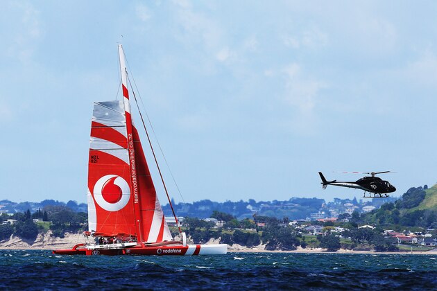 AUCKLAND, NEW ZEALAND - NOVEMBER 19:  A view of Team Vodafone Sailing trimaran which is being remotely control by America's Cup skipper Jimmy Spithill as it races against a challenger catermeran in Auckland's Hauraki Gulf on November 19, 2014 in Auckland, New Zealand.  Both catermeran are being controlled by Samsung GALAXY Note 4 smartphone remotely by the skippers who are in a helicopter above the boats.  (Photo by Hannah Peters/Getty Images for Vodafone)