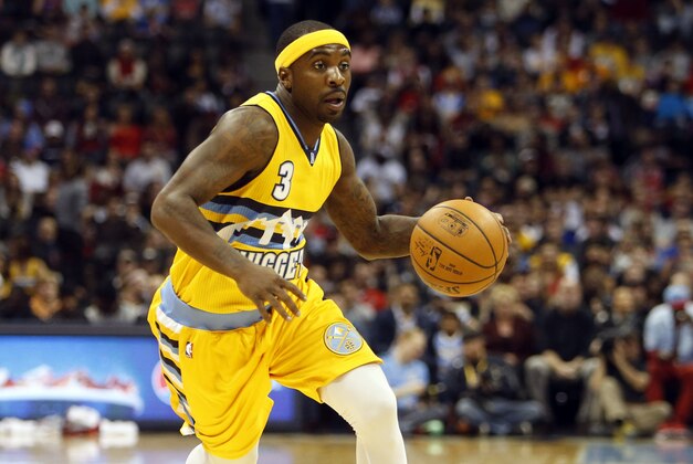 Nov 25, 2014; Denver, CO, USA; Denver Nuggets guard Ty Lawson (3) drives to the basket during the first half against the Chicago Bulls at Pepsi Center. Mandatory Credit: Chris Humphreys-USA TODAY Sports