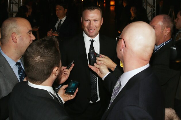 TORONTO, ON - NOVEMBER 17:  Martin Broduer speaks with the media on the red carpet prior to the induction ceremony at the Hockey Hall of Fame on November 17, 2014 in Toronto, Canada.  (Photo by Bruce Bennett/Getty Images)