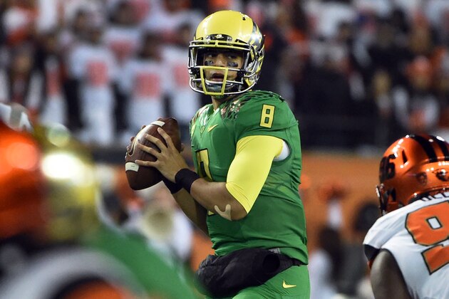 CORVALLIS, OR - NOVEMBER 29: Quarterback Marcus Mariota #8 of the Oregon Ducks passes the ball during the fourth quarter of the game against the Oregon State Beavers at Reser Stadium on November 29, 2014 in Corvallis, Oregon. (Photo by Steve Dykes/Getty Images)
