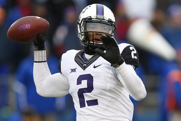 LAWRENCE, KS - NOVEMBER 15:  Trevone Boykin #2 of the TCU Horned Frogs drops back for a pass against the Kansas Jayhawks in first quarter at Memorial Stadium on November 15, 2014 in Lawrence, Kansas. (Photo by Ed Zurga/Getty Images)