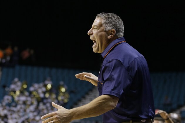 Auburn head coach Bruce Pearl coaches against Tulsa during the first half of an NCAA college basketball game Monday, Nov. 24, 2014, in Las Vegas. (AP Photo/John Locher)