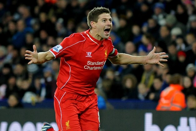 Liverpool's Steven Gerrard celebrates after scoring against Leicester during the English Premier League soccer match between Leicester City and Liverpool at King Power Stadium, in Leicester, England, Tuesday, Dec. 2, 2014.  (AP Photo/Rui Vieira)