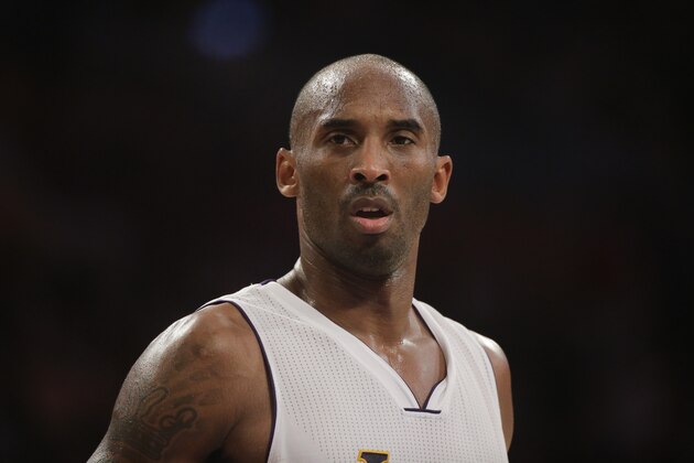 Los Angeles Lakers' Kobe Bryant during the second half of an NBA basketball game against the Toronto Raptors Sunday, Nov. 30, 2014, in Los Angeles. The Lakers won 129-122 in overtime. (AP Photo/Jae C. Hong)
