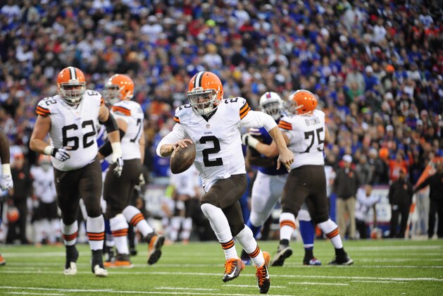 Cleveland Browns quarterback Johnny Manziel runs in for a score against the Buffalo Bills during the second half of an NFL football game, Sunday, Nov. 30, 2014, in Orchard Park, N.Y. (AP Photo/Gary Wiepert)