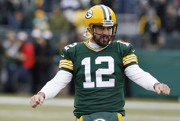 Green Bay Packers' Aaron Rodgers before an NFL football game against the New England Patriots Sunday, Nov. 30, 2014, in Green Bay, Wis. (AP Photo/Mike Roemer)