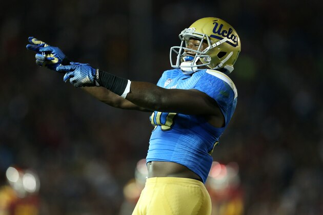 PASADENA, CA - NOVEMBER 22:   Linebacker Myles Jack #30 of the UCLA Bruins celebrates after the Bruins stopped the USC Trojans on fourth down on the five yard line to take over on downs on the final play of the first quarter at the Rose Bowl on November 22, 2014 in Pasadena, California.  (Photo by Stephen Dunn/Getty Images)