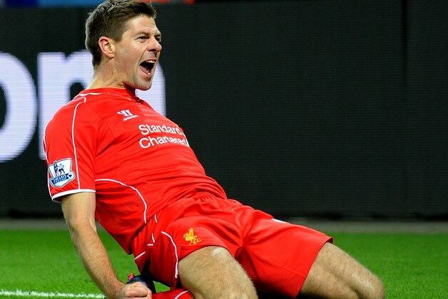 Liverpool's Steven Gerrard celebrates scoring against Leicester during the English Premier League soccer match between Leicester City and Liverpool at King Power Stadium, in Leicester, England, Tuesday, Dec. 2, 2014. (AP Photo/Rui Vieira)