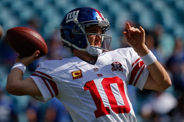 JACKSONVILLE, FL - NOVEMBER 30:  Eli Manning #10 of the New York Giants warms up on the field prior to the game against the Jacksonville Jaguars at EverBank Field on November 30, 2014 in Jacksonville, Florida.  (Photo by Chris Trotman/Getty Images)